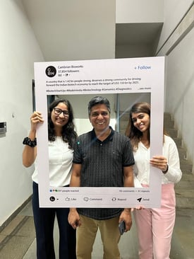 cambrian bioworks teams posing with instagram prop