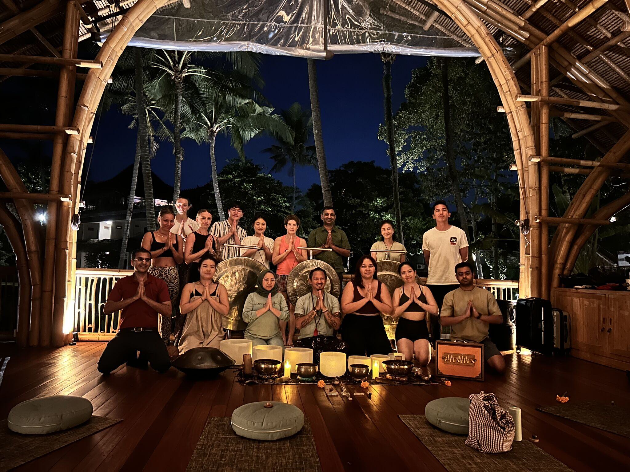 Cohort relaxing with sound meditation at the end of the day in Bali